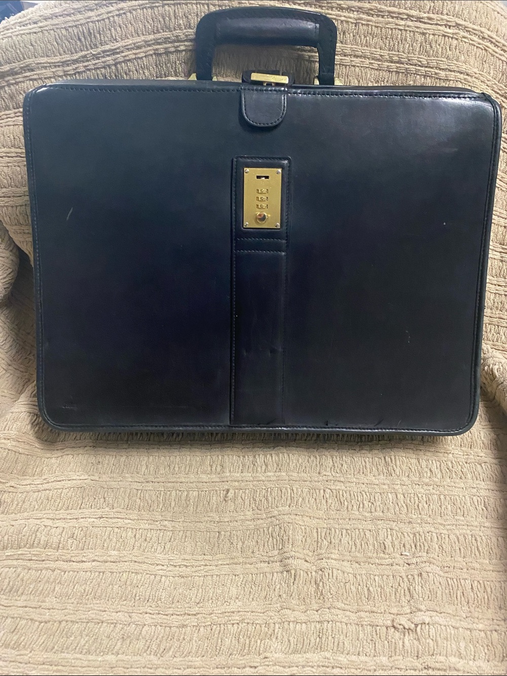 Sleek Black Leather Briefcase with Gold Lock
